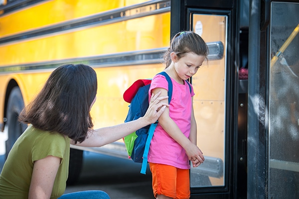 elementary student nervous to get on school bus