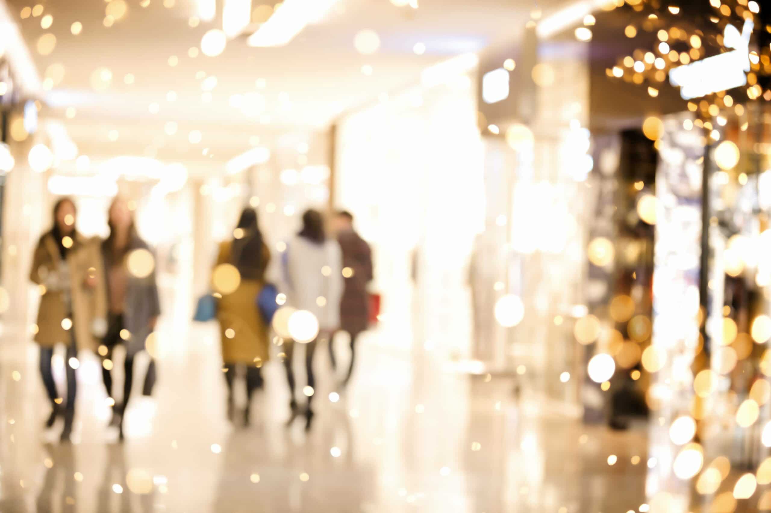 Shopping mall blur background with holiday lights