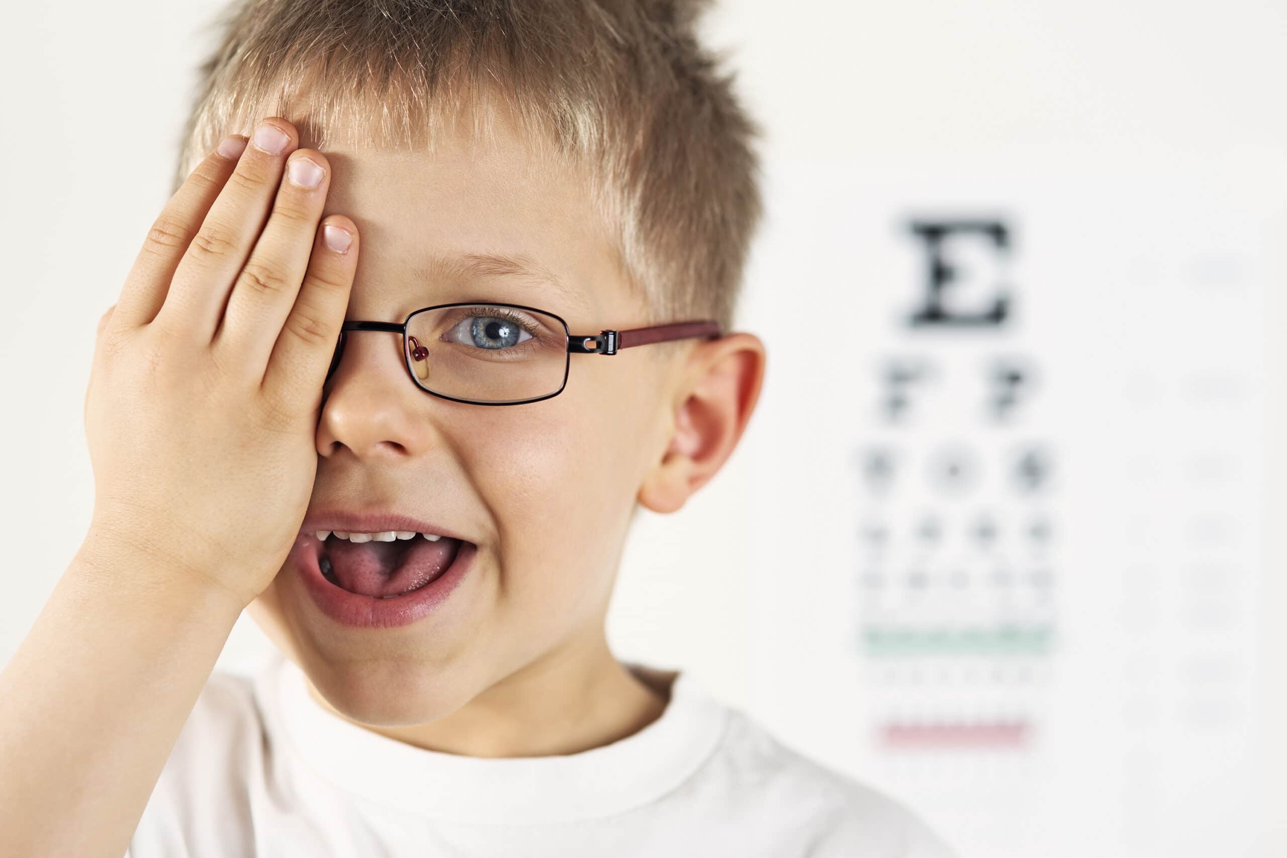 Little boy having eye exam.