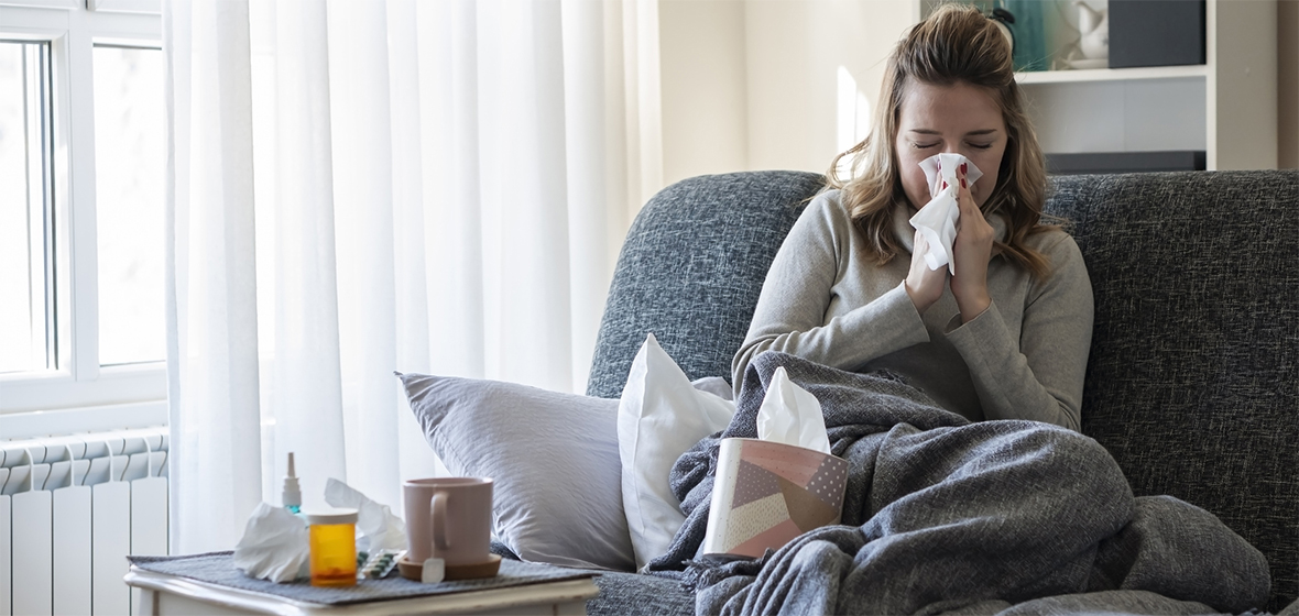 Sick woman at home, COVID, flu, cold