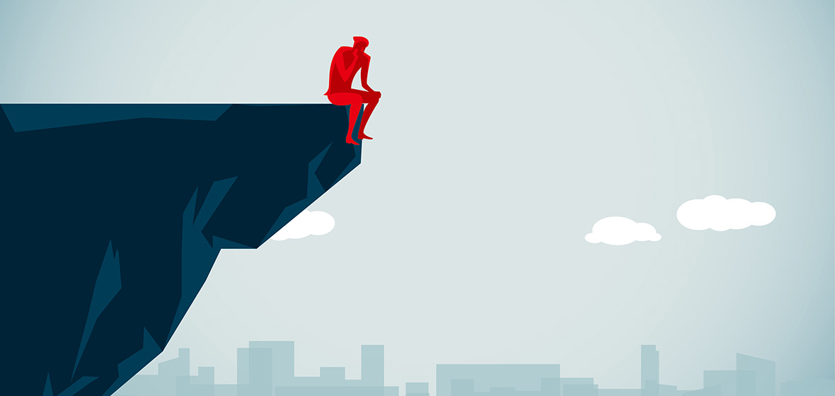 Vector image of man sitting on the edge of a cliff