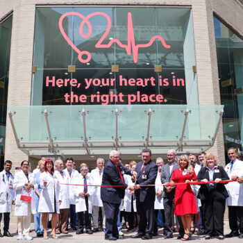 Ribbon cutting in front of UofL Health – Heart Hospital