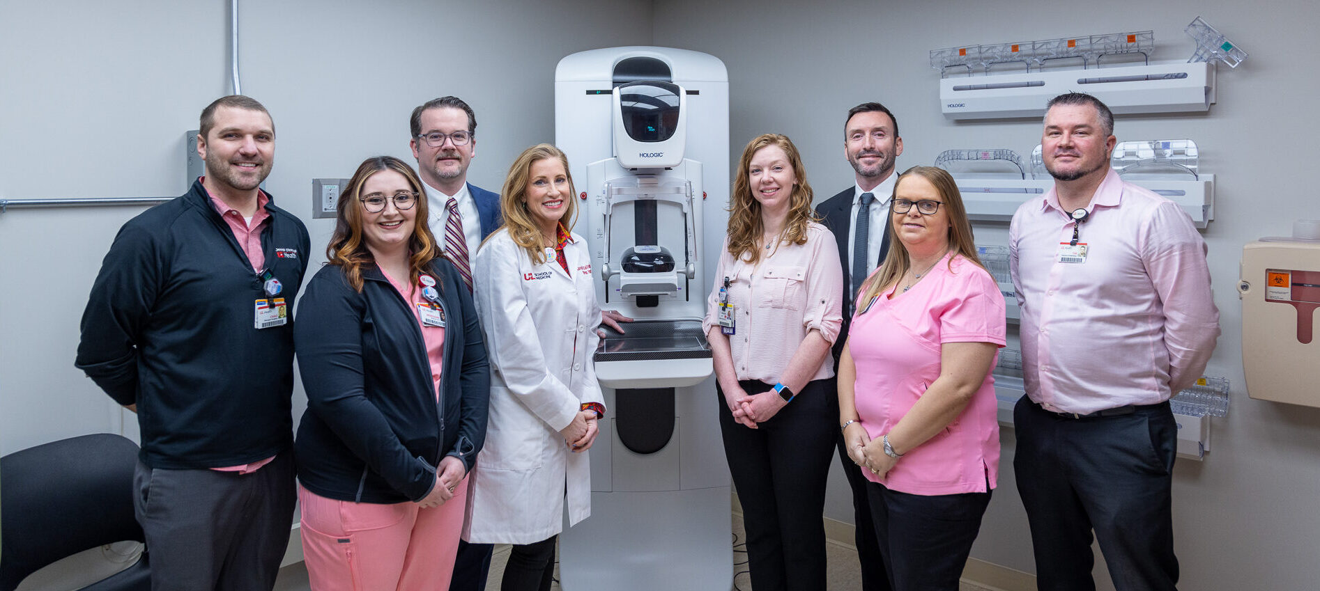 Breast Care Team at UofL Health – Medical Center Northeast posing with new Genius 3D Mammography system.