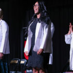 Louisville Central High School students received their white doctor's coats as part of the Pre-Medical Magnet Program.